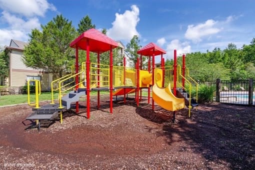 Red and Yellow Playground on Mulch