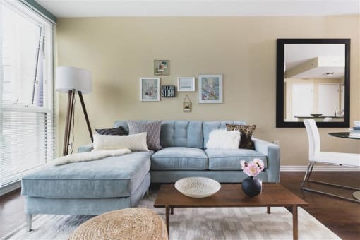 Living Room with large sofa at Wilshire Vermont, Los Angeles, CA 90010
