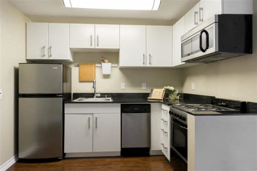 Kitchen with modern appliances at Wilshire Vermont, CA 90010