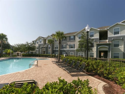 Relaxing Area By The Pool at Camri Green Apartments, Jacksonville
