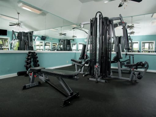 Gym with weights and mirrors at West Wind Landing, Savannah, GA, 31410