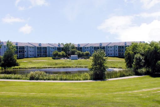 Outdoor View of property overlooking pond