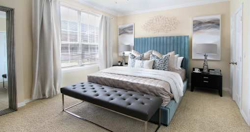 Luxury apartments with spacious bedrooms with attached bathrooms and walk-in closets at TurtleCreek apartments in West Des Moines, Iowa