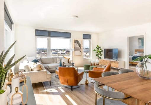 Two bedroom view of living room and windows facing west
