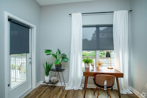 This is the living room view to the outside balcony  at Grand Flats, St. Louis, 63104
