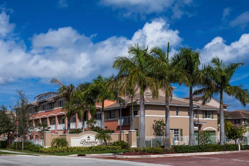 Preserve at Boynton Beach community exterior with palm trees at Preserve at Boynton Beach, Boynton Beach, Florida