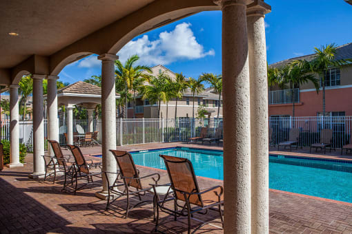 Preserve at Boynton Beach resort style pool with lounge chairs at Preserve at Boynton Beach, Boynton Beach, FL