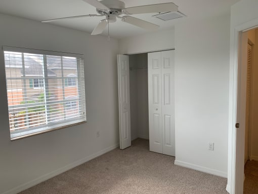 Preserve at Boynton Beach apartment home bedroom with ceiling fan at Preserve at Boynton Beach, Boynton Beach
