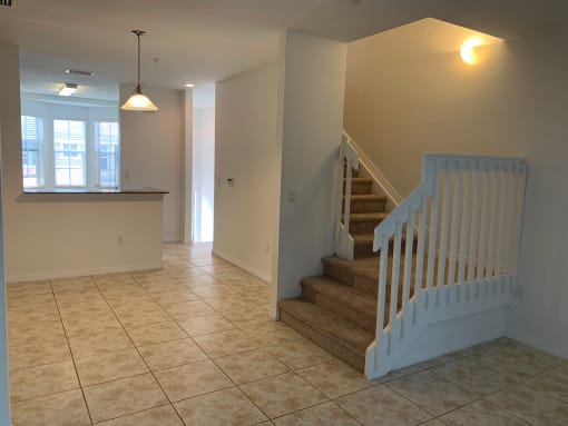 home living area and stairs at Preserve at Boynton Beach, Boynton Beach, Florida