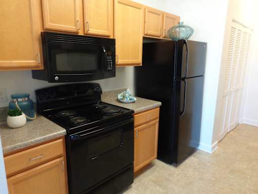 kitchen with appliances in apartment home