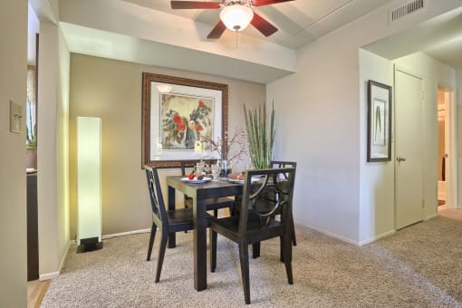 dining area with accent wall