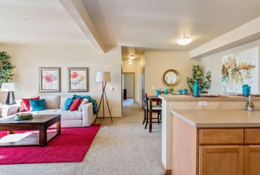 a living room with a couch and a table