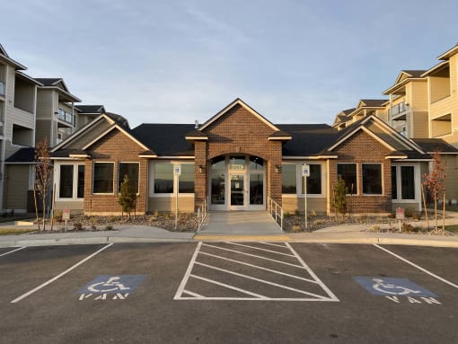 a building with a parking lot in front of it
