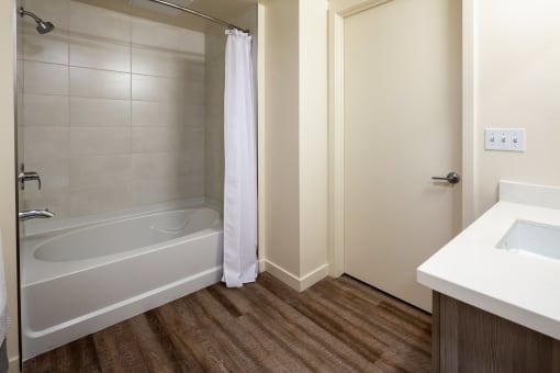 Bathroom With Bathtub at Topaz Apartments, Los Angeles, CA, 90013