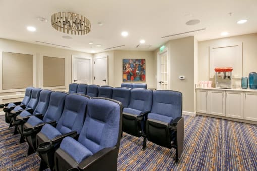 A row of blue chairs are lined up in a room at White Springs Senior Living, Warrenton