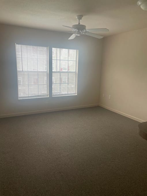 Bedroom with window at MADISON MANOR, JACKSONVILLE