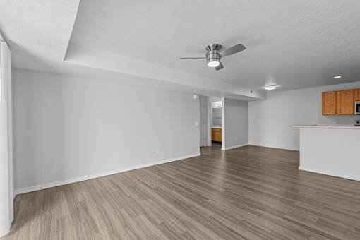 Expansive living room with plank flooring at Eagles Landing, Idaho