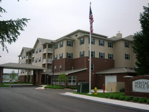 Exterior of Heritage Place, tall cream and brick building