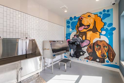 A dog-themed mural in a room at The Remington, Lexington, KY