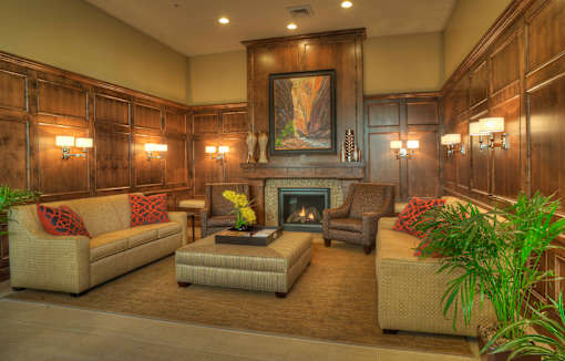 Liberty Gateway Apartments, Salt Lake City, Utah, lobby with a fireplace and a painting above it.