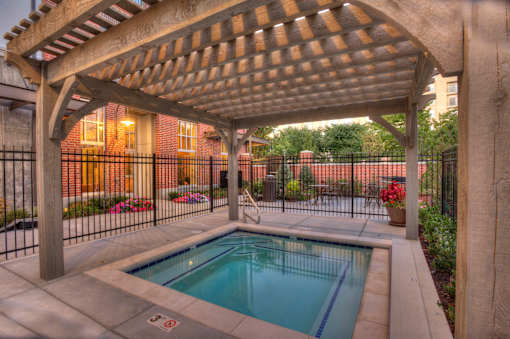 Liberty Gateway Apartments, Salt Lake City, Utah, hot tub/spa under a wooden pergola.
