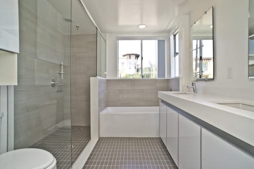 Master Bathroom with Double Sinks, Full-Size Bathtub, and Walk-In Shower