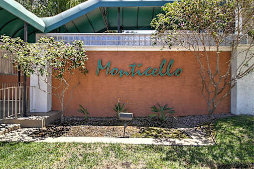 A Monticello sign is on a building.