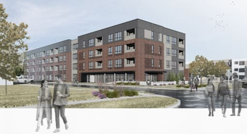 modern apartment building with people walking in front.