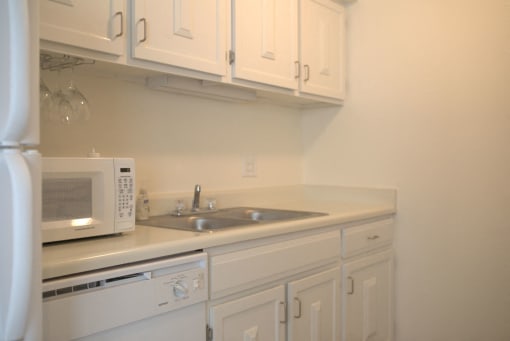 Renovated Apartments with Separate Kitchens:Microwaves , Dishwashers at Woodmere Townhomes, Wisconsin, 53012