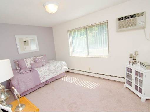 Bedroom in Okemos Village Apartments in Okemos, MI
