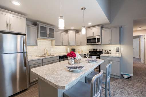 Updated Kitchen Pine Lane Estates Apartments in Lansing near Eastwood Towne Center