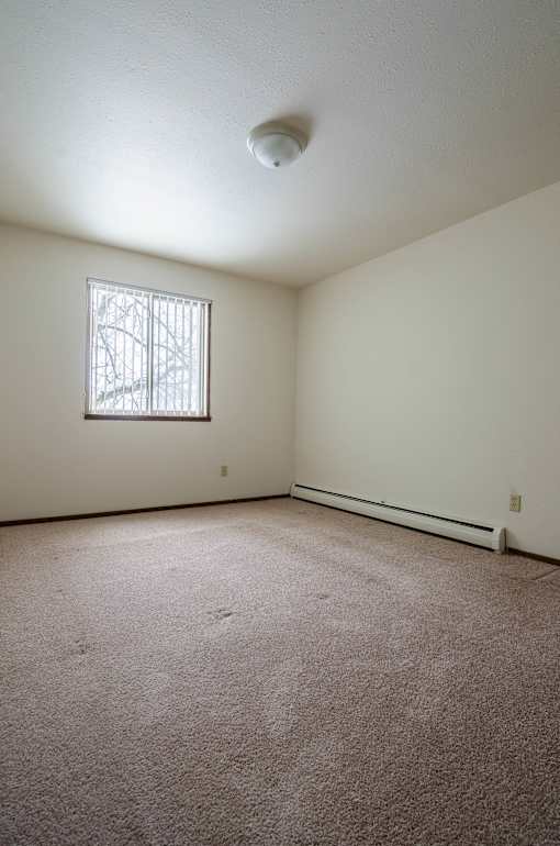 Bedroom at Sycamore apartments in Holt, MI