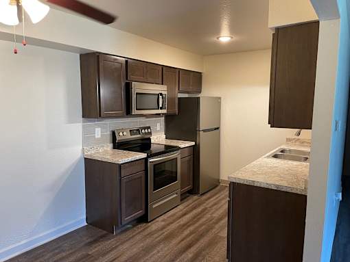 Kitchen at Whispering Pines Apartments in Holland, Michigan