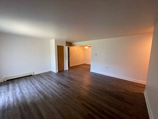 Living room at Whispering Pines Apartments in Holland, Michigan