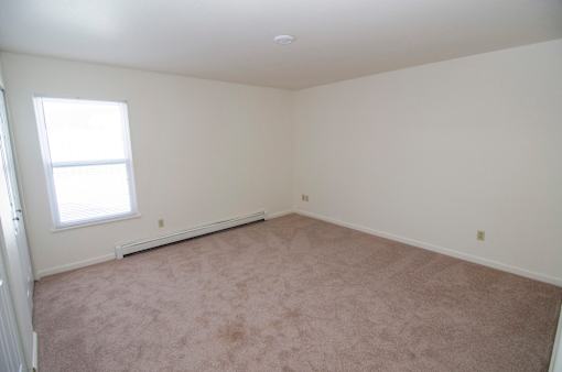 Bedroom at Whispering Pines Apartments in Holland, Michigan