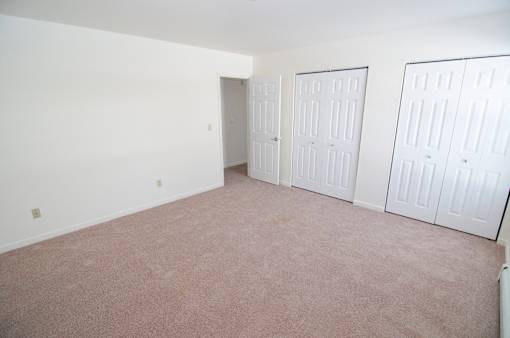 Bedroom at Whispering Pines Apartments in Holland, Michigan