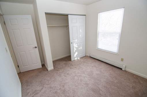 Bedroom at Whispering Pines Apartments in Holland, Michigan