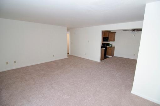 Living room at Whispering Pines Apartments in Holland, Michigan