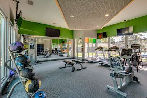 Gym  at Abbott Pointe Apartments in East Lansing, MI near Michigan State University