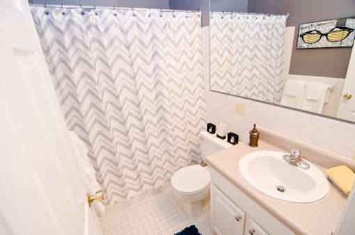 Bathroom  at Abbott Pointe Apartments in East Lansing, MI near Michigan State University