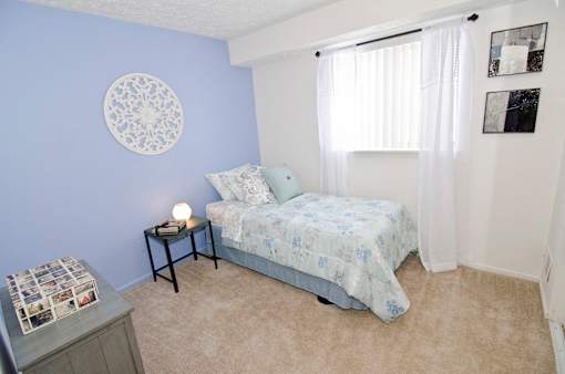 Spacious bedrooms in East Lansing Apartments near Michigan State University | Burnt Tree