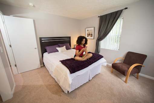 Spacious bedrooms in East Lansing Apartments near Michigan State University | Woodbrook Village Apartments
