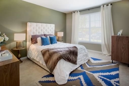 Bedroom With Expansive Windows at The Waverly at Neptune, New Jersey