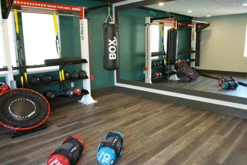 Fully Equipped Gym with Free Weights and Exercise Machines at ABQ Apartments for Rent