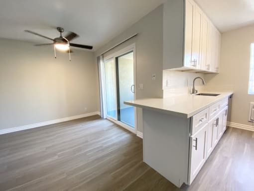 View of living room with balcony entrance