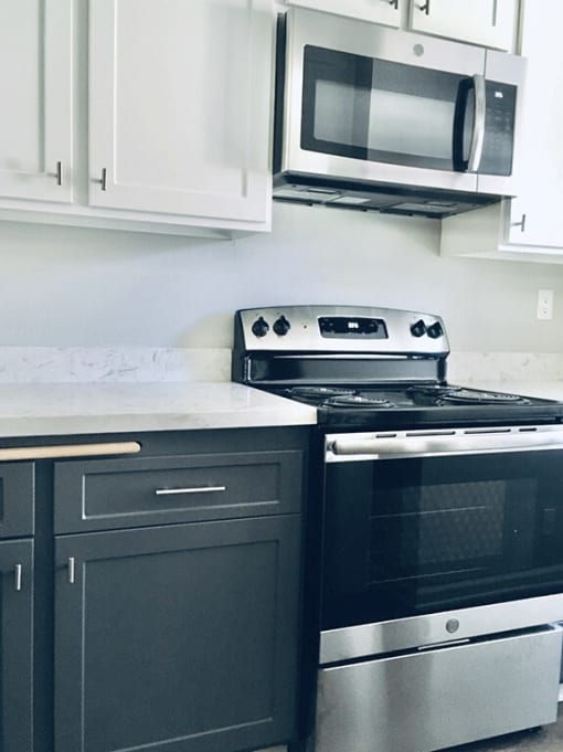 Kitchen With New Appliances at Wilbur Oaks Apartments, California, 91360