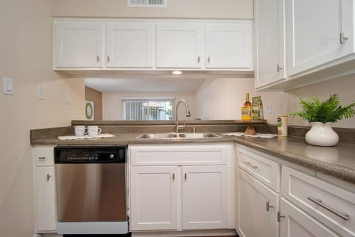 Granite Counter Tops, Coffee Cup In Kitchen at Wilbur Oaks Apartments, Thousand Oaks, CA, 91360