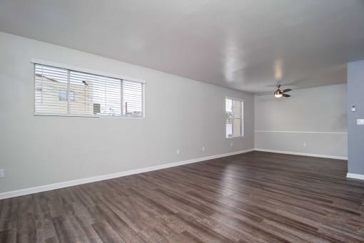 Carpeted Lounge Area with Ceiling Fan at Los Robles Apartments, Pasadena