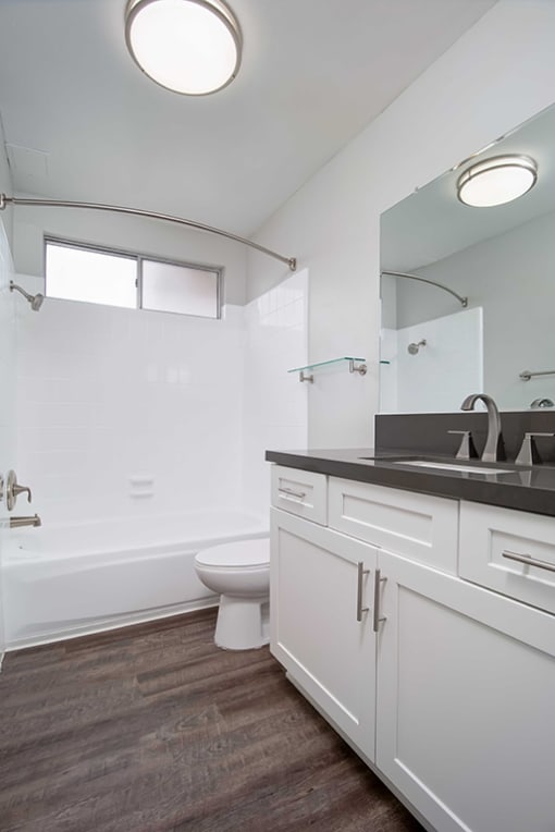 Tub, Toilet In Bathroom at Los Robles Apartments, Pasadena, California