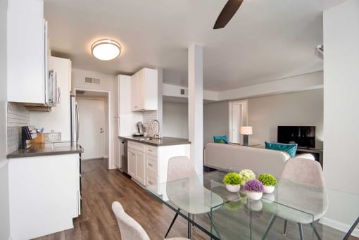 Glass table, TV in Living Room at Los Robles Apartments, California, 91101
